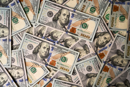 Background of money American hundred dollar bills. Shallow dof.