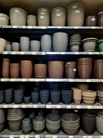 Ceramic flower pots on shelves in the store for sale.の写真素材