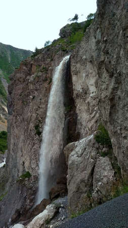 great waterfall falls from the cliff