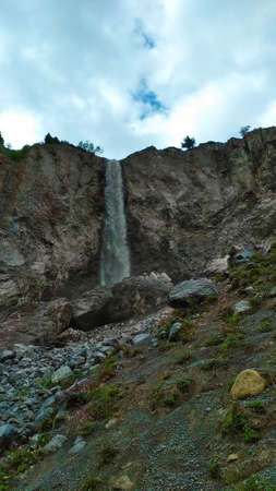 big beautiful waterfall in the mountains