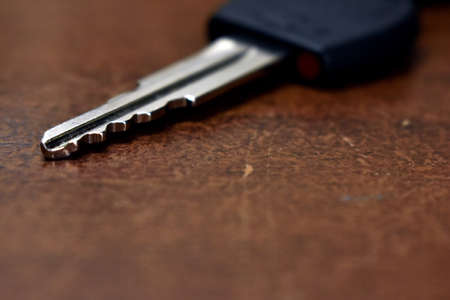 car key on a wooden tableの写真素材