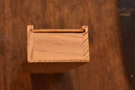 Game of dominoes in a wooden box