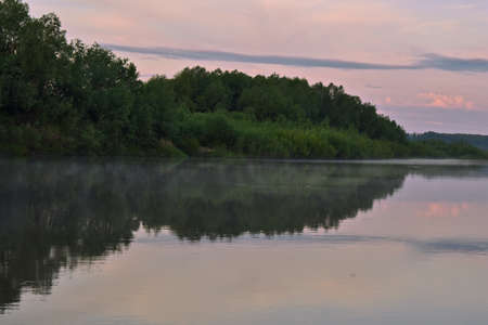 gentle beautiful dawn on a small riverの写真素材