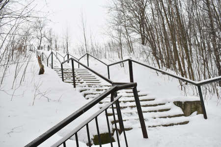 long stairs in winter in the snow