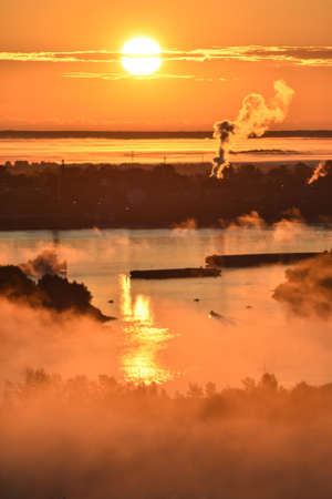 dawn over the cable car across the riverの写真素材