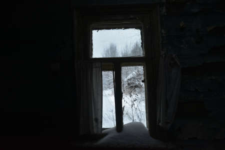 abandoned village in the snow in winter
