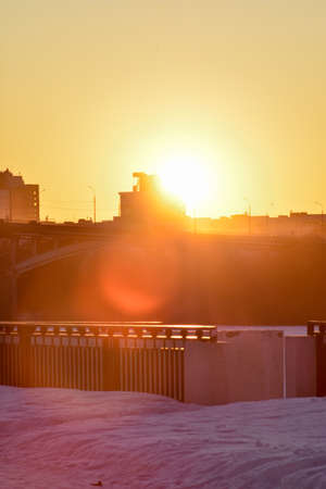 winter sunset on the city's waterfrontの写真素材