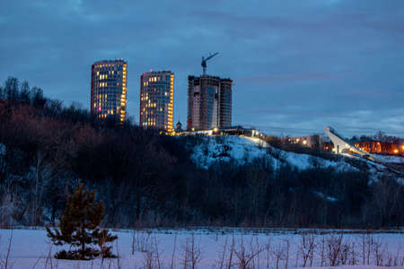 buildings glow at night in the city