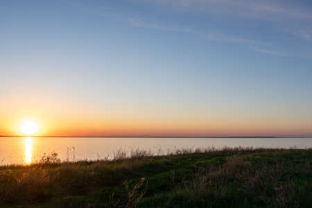 sunset on the river bankの写真素材