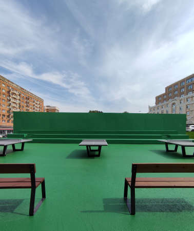 table tennis tables are on the street of the cityの写真素材
