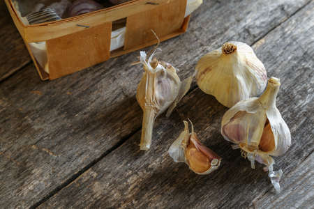 Garlic on an old wooden table