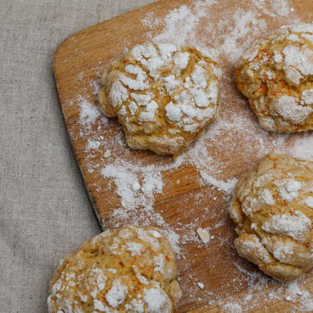 Homemade cookies on a table with a linen tablecloth