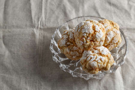Homemade cookies on a table with a linen tableclothの写真素材