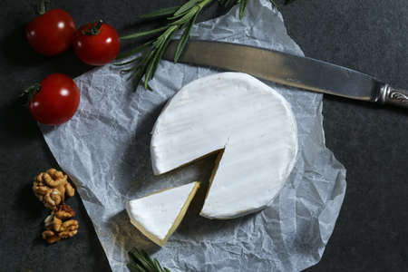 Still life with cheese on a dark backgroundの写真素材
