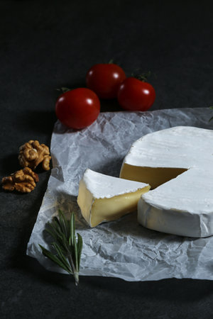 Still life with cheese on a dark backgroundの写真素材