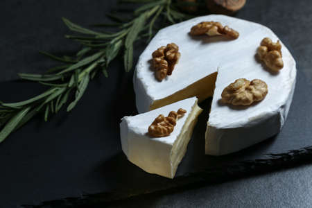 Still life with cheese on a dark backgroundの写真素材