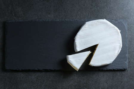 Still life with cheese on a dark backgroundの写真素材