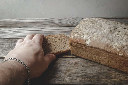 Homemade natural rye-wheat bread without yeast, with rye sourdough. Useful for health.の写真素材
