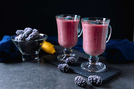 Frozen banana and blackberry smoothie. A healthy drink without sugar. Nice cooling on a hot day.の写真素材