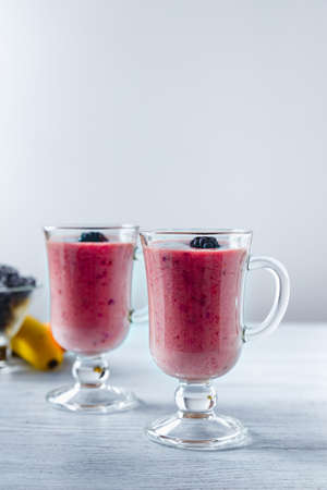 Frozen banana and blackberry smoothie. A healthy drink without sugar. Nice cooling on a hot day.の写真素材