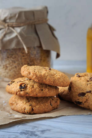 Homemade oatmeal cookies with raisins, coconut and cinnamon.の写真素材