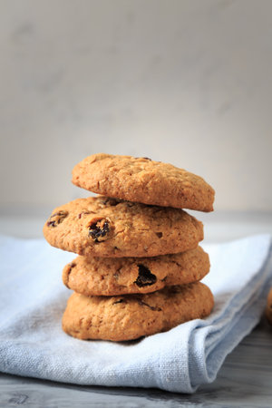Homemade oatmeal cookies with raisins, coconut and cinnamon.の写真素材