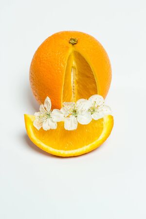 Sweet ripe orange on a white backgroundの写真素材