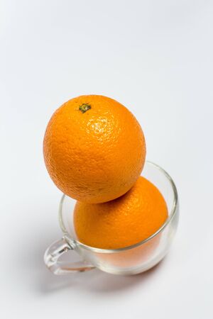 Sweet ripe orange on a white backgroundの写真素材