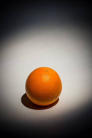 Sweet ripe orange on a white backgroundの写真素材