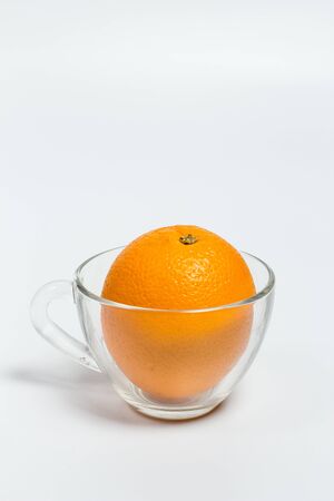Sweet ripe orange on a white backgroundの写真素材