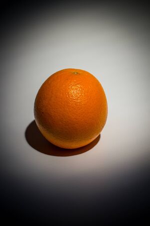 Sweet ripe orange on a white backgroundの写真素材