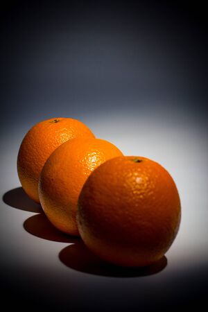 Sweet ripe orange on a white backgroundの写真素材