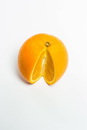 Sweet ripe orange on a white backgroundの写真素材