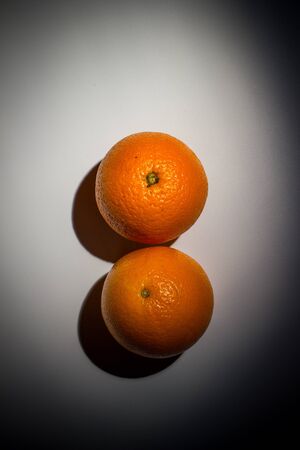 Sweet ripe orange on a white backgroundの写真素材