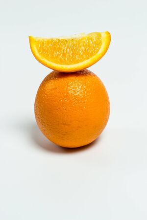Sweet ripe orange on a white backgroundの写真素材
