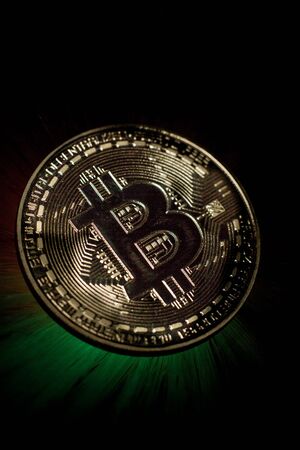 Bitcoin gold coin with beautiful backlightingの写真素材