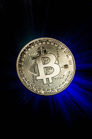 Bitcoin gold coin with beautiful backlightingの写真素材