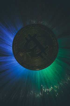 Bitcoin gold coin with beautiful backlightingの写真素材