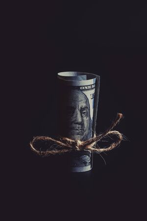 Dollar tied with a ropeの写真素材
