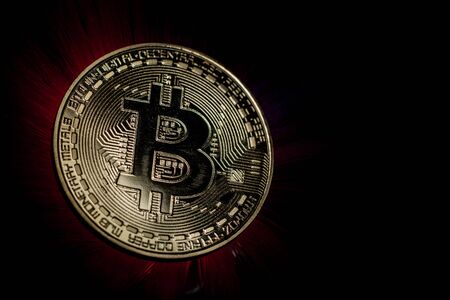 Backlit Bitcoin Coinの写真素材