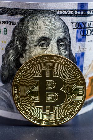 Bitcoin coin and dollar billの写真素材