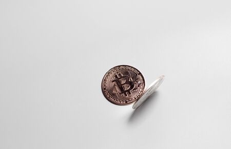 Two bitcoin coins on a white backgroundの写真素材
