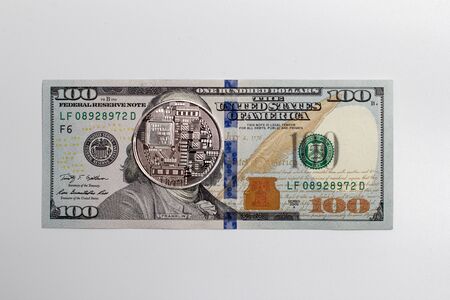 Bitcoin coin and dollar billsの写真素材