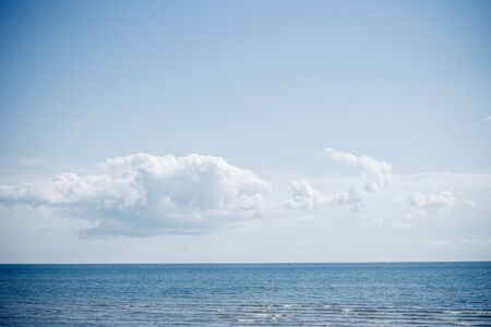 Beautiful volumetric clouds in the blue skyの写真素材
