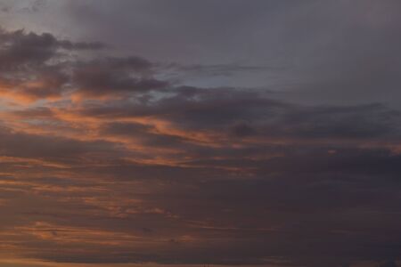 Beautiful clouds during summer sunsetの写真素材