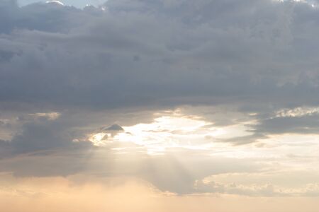 Beautiful clouds during summer sunsetの写真素材