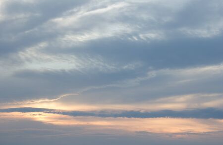 Beautiful clouds during sunsetの写真素材