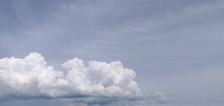 Beautiful volumetric clouds in the blue skyの写真素材