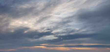 Beautiful clouds during sunsetの写真素材