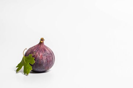 Ripe tasty figs on a white backgroundの写真素材